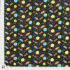 Brightly colored Dog Toys and Frisbies are printed on an All Cotton, black background fabric.