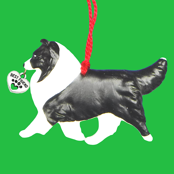 Fun Hand-Crafted Sheltie Bi Black Dog Christmas Ornaments made from durable break-resistant resin, hand-painted for a realistic look. Many Dog Breed Ornaments are represented in various breed color patterns to uniquely decorate your tree or a stand for year long use. Order Dog Ornaments customized to match your Own Best Friend's colors and markings. Heart charm included plus others from which to choose. Yuletide Decorations for the season.