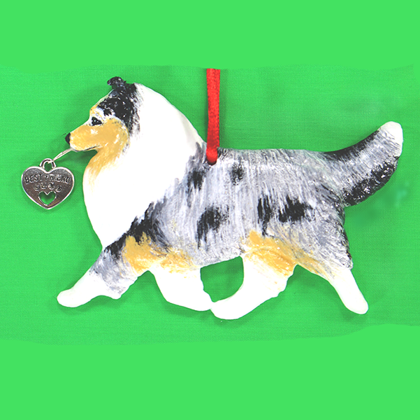 Fun Hand-Crafted Shelti Blue Merle Dog Christmas Ornaments made from durable break-resistant resin, hand-painted for a realistic look. Many Dog Breed Ornaments are represented in various breed color patterns to uniquely decorate your tree or a stand for year long use. Order Dog Ornaments customized to match your Own Best Friend's colors and markings. Heart charm included plus others from which to choose. Yuletide Decorations for the season.