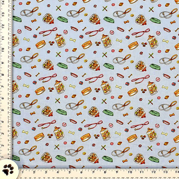 Dog Leashes, dog bowls, treats amd collars are printed onto light blue Al Cotton fabric by Cloth Works